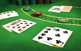 Roulette wheel and betting board in live-dealer studio